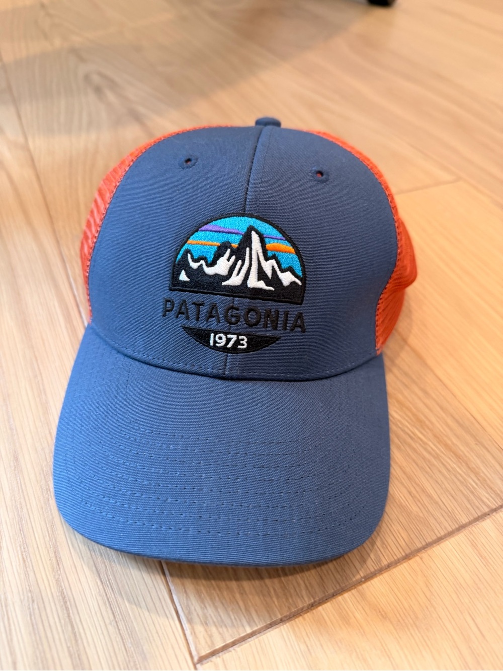 Patagonia Women’s Navy & Orange Mesh Trucker Hat